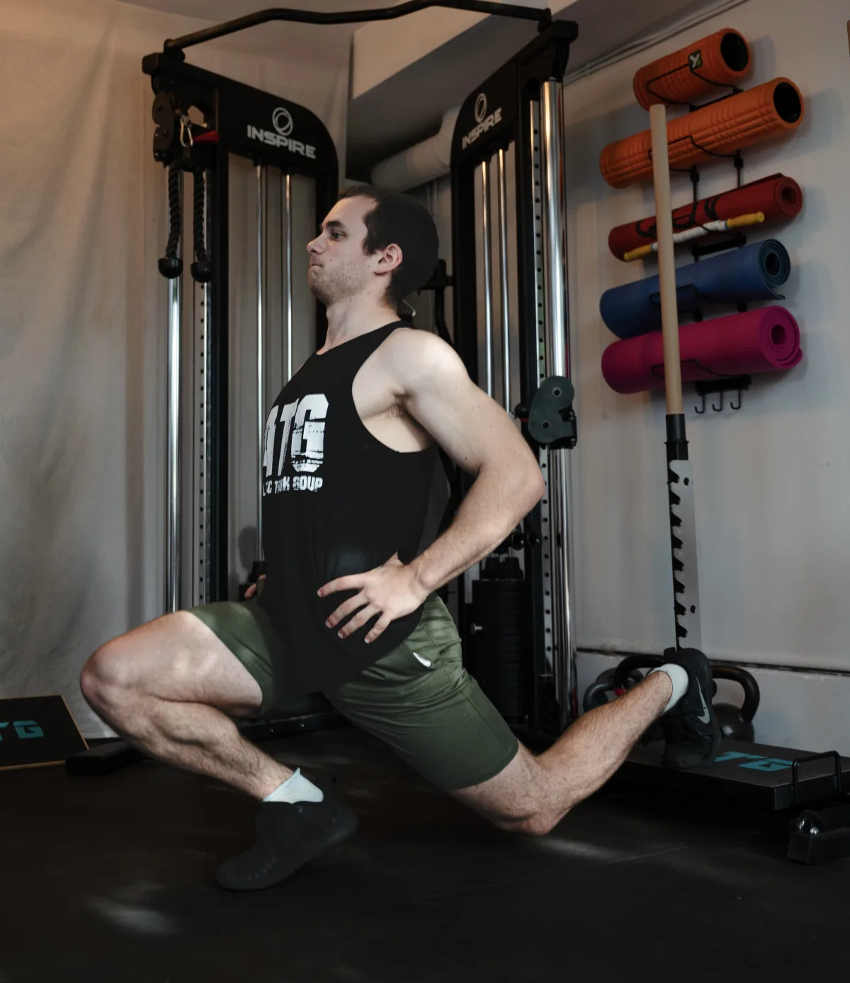 Wilson Pelot demonstrating a split-squat lunge